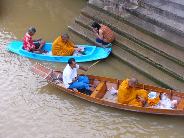 monks collecting food